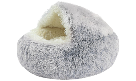 Slipper-shaped pet bed in grey with a fluffy interior, soft material, cosy, enclosed space for pets to rest.