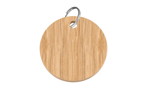 Wooden circle-shaped dog tag, 38mm x 25mm, FSC-certified wood, with a silver ring, customisable with personalised dog name.
